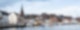 Unter grauem Himmel ist die Fördelinie der Stadt Flensburg zu sehen.