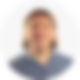 Dr. Lassen, ein MAnn mit längeren Haaren, schaut direkt in die Kamera.